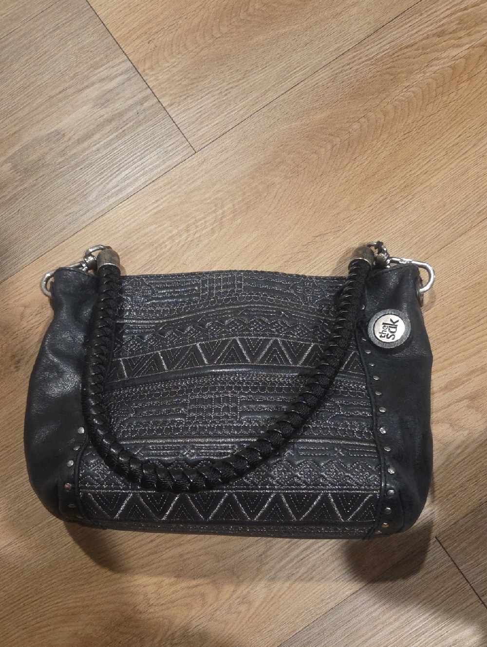 The Sak Black Braided-Handle Embossed Shoulder Bag